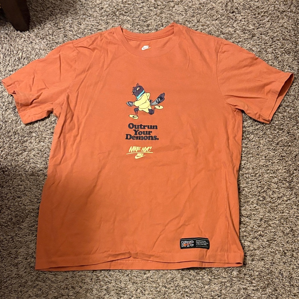 Nike Orange Crewneck Tee “Outrun your Demons”